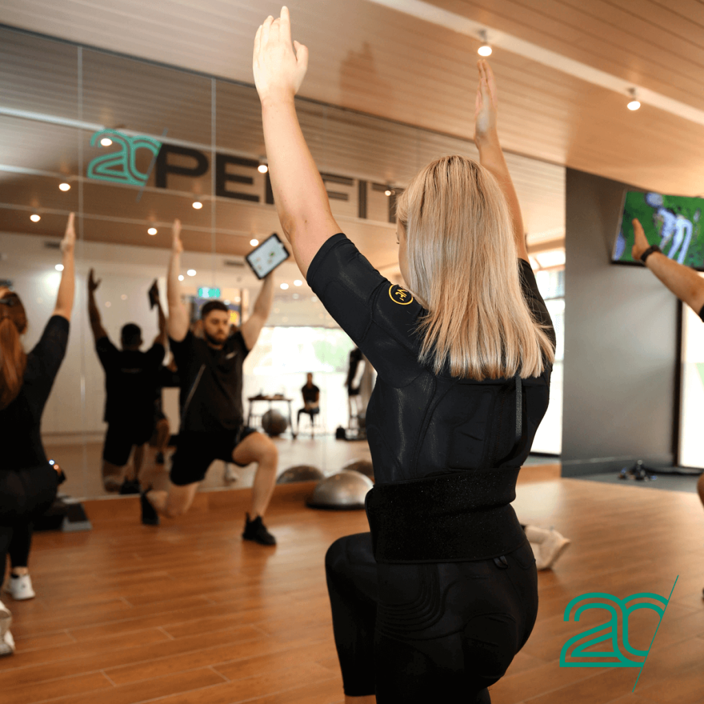 Woman Exercising with a Class at the 20PerFit Parramatta Studio